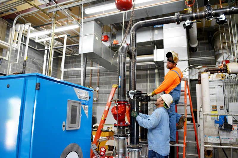 hvac technician testing air quality