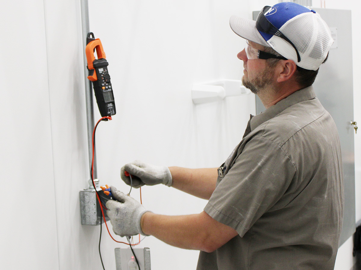 electrician troubleshooting electrical system