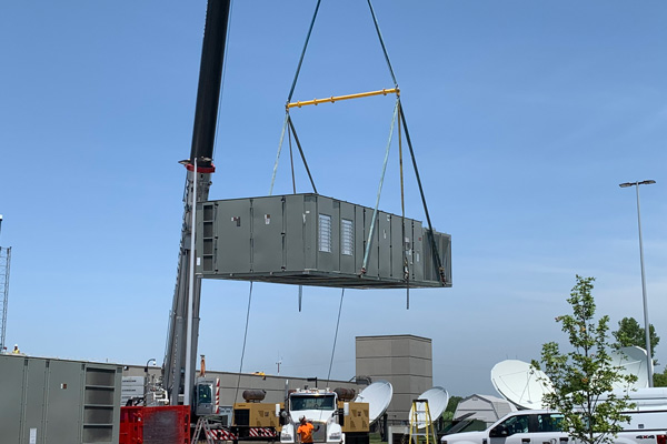installing rooftop mechanical systems with crane